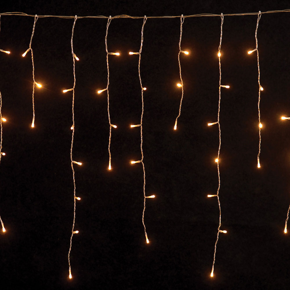 100 Led λαμπάκια κουρτίνα IP44 επεκτεινόμενη με διάφανο καλώδιο και θερμό λευκό φως 2μ